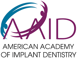 The image is a logo for the American Academy of Implant Dentistry.