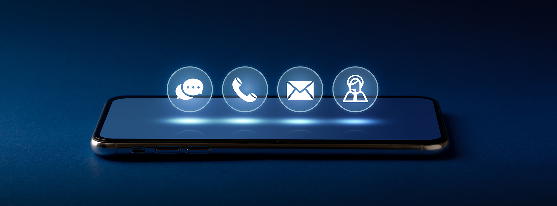 A smartphone displaying a user interface with four icons representing different services or applications, set against a dark background.