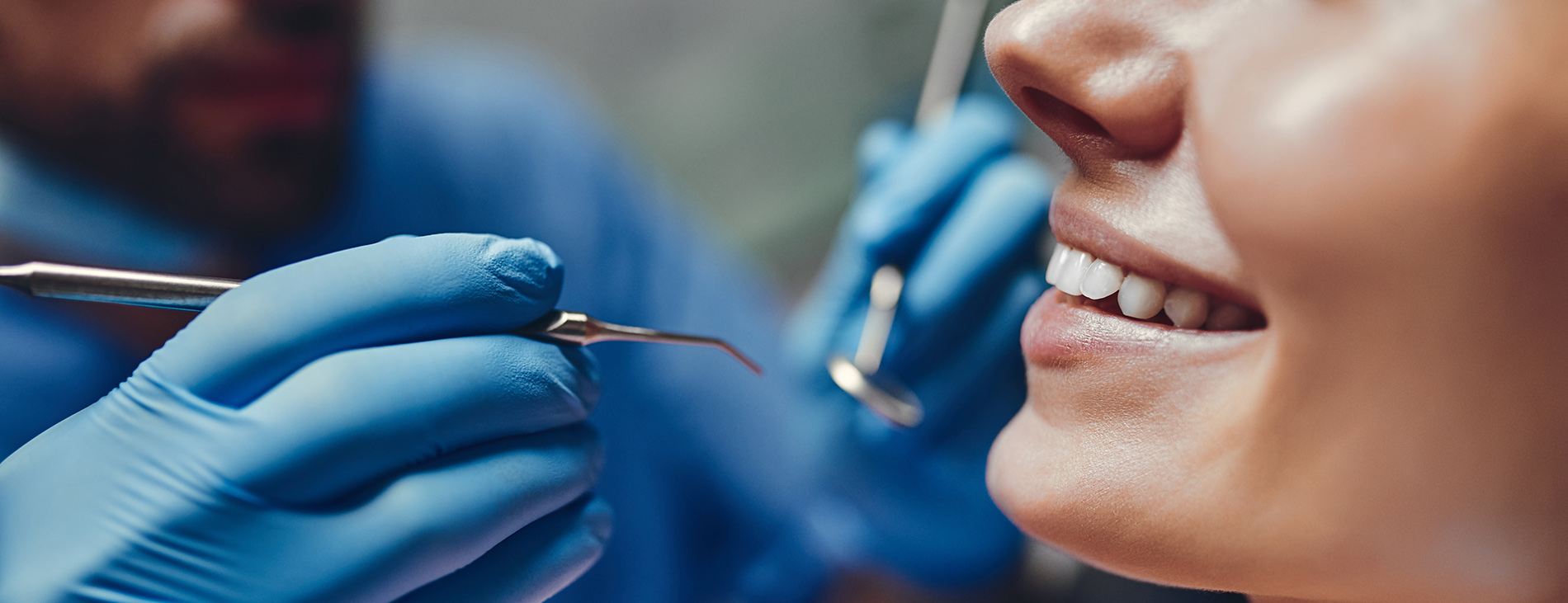 A dental professional working on a patient s teeth, with the focus on oral care and hygiene.