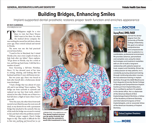 The image is a screenshot of an article from a newspaper or magazine. It features a woman in the foreground, smiling and looking directly at the camera. She has gray hair and is wearing a patterned top with a floral design. In the background, there s a headline that reads  Central Restorative   Implant Dentistry Building Bridges  Enhancing Smiles  with a subheadline stating  Implant supported dental prosthetics restore smiles and enhance overall quality of life.  Below the headline, there is a photo of a patient s mouth showing dental implants. The text on the image includes the name  Dr. Ravi Peja,  which suggests he is associated with the dental practice mentioned in the article. There is also a quote attributed to Dr. Peja and a brief description of his professional background, indicating that he has been practicing dentistry for over 20 years. The image appears to be promoting the services offered by Central Restorative   Implant Dentistry and showcasing the results of dental implants provided by the practice.