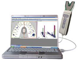 An open laptop displaying medical imaging, accompanied by a handheld device with a screen and an antenna, suggesting a diagnostic or medical monitoring context.